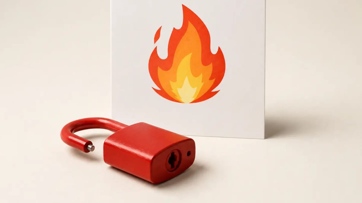 The Mojo flame logo printed on a white card with a red open padlock in front of it
