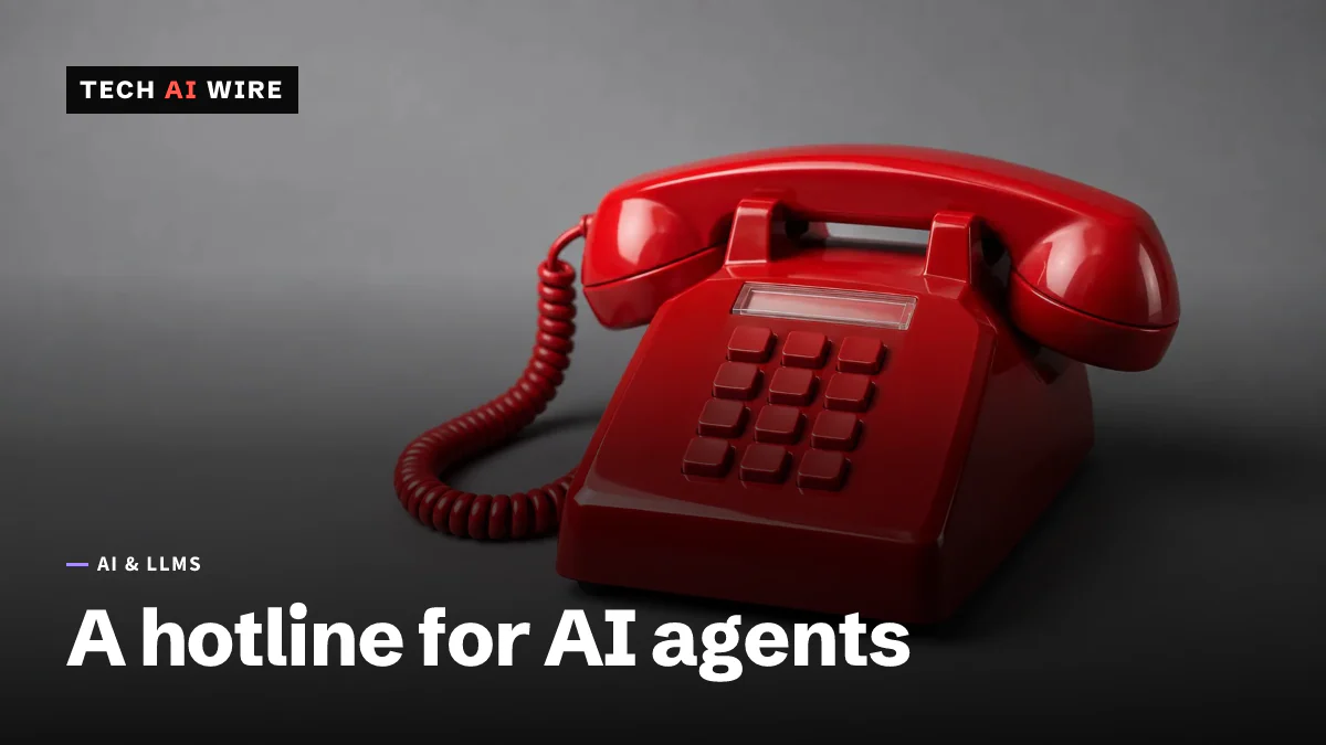 A classic red desk telephone with a coiled cord, handset in its cradle, on a plain gray studio backdrop.