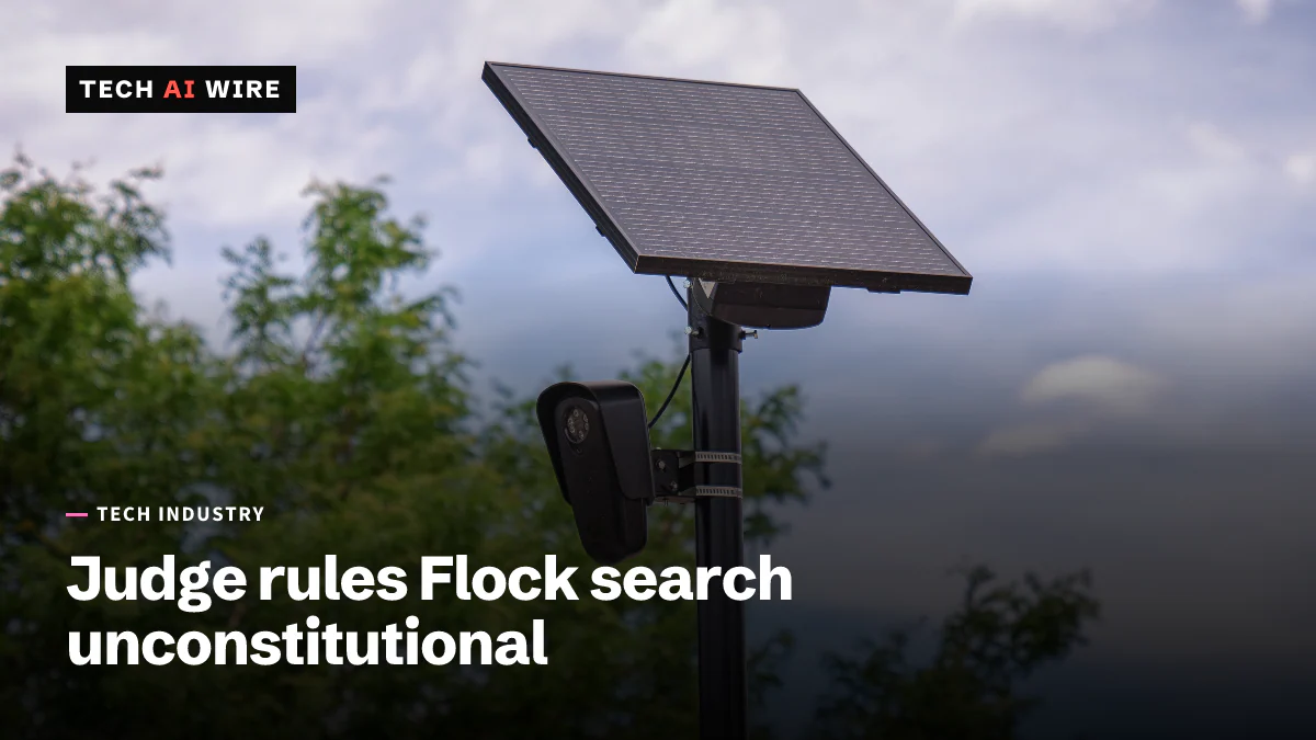 A black Flock Safety license plate reader camera mounted on a metal pole below a small solar panel, with trees and a cloudy sky behind it.