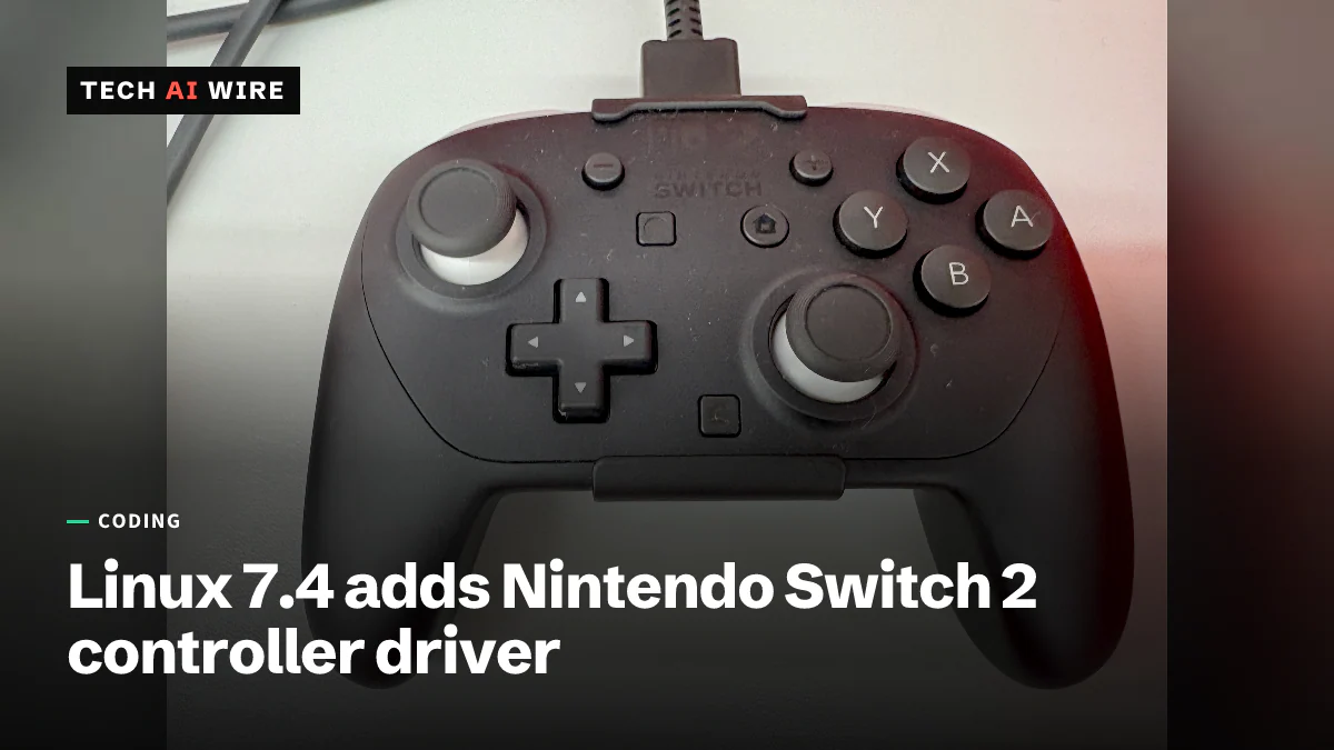 A black Nintendo Switch 2 Pro Controller connected by a USB cable, lying on a light gray surface.