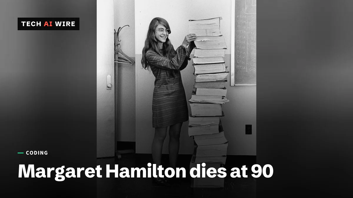 Margaret Hamilton in 1969, smiling beside a stack of printed listings of the Apollo flight software taller than she is.