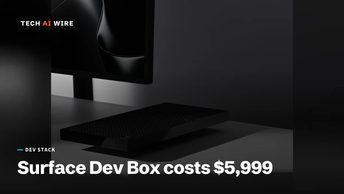 A flat black Surface RTX Spark Dev Box with a grid-patterned top sits on a white desk below a monitor.