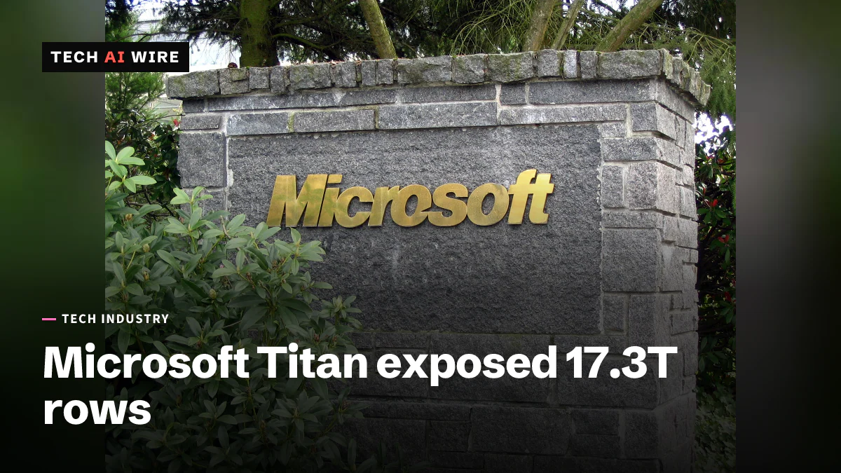 灰色の石の看板に掲げられた金色のMicrosoftロゴ。緑の低木に一部囲まれています。