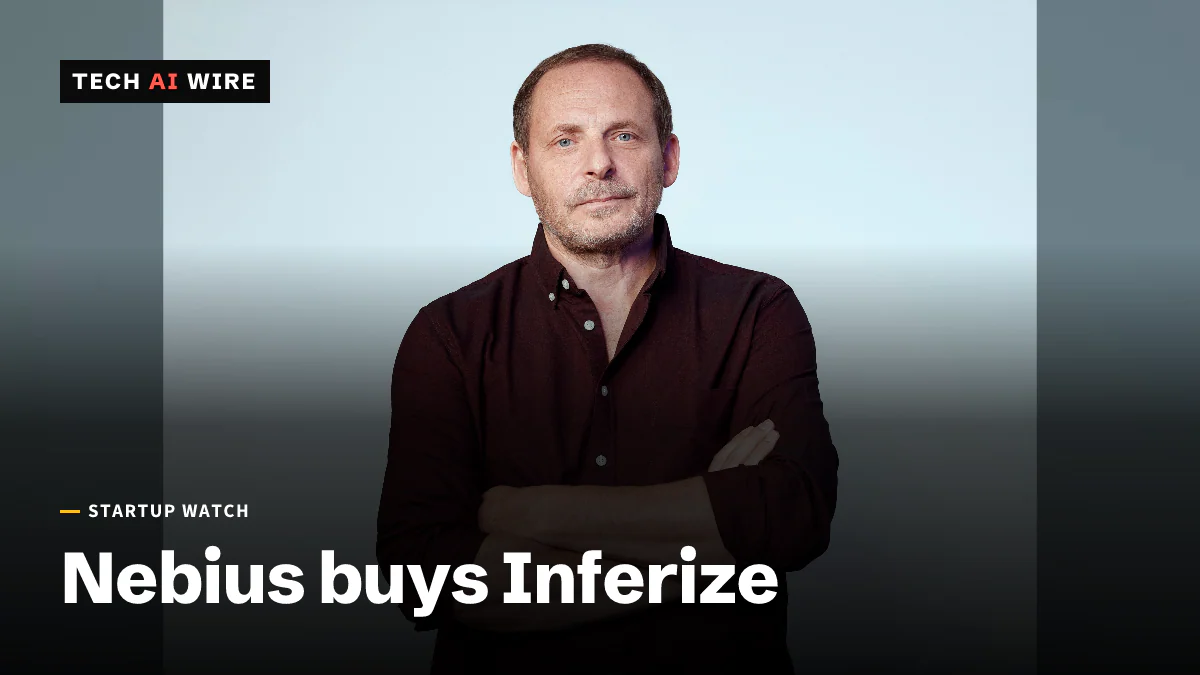 Le PDG de Nebius, Arkady Volozh, les bras croisés, vêtu d'une chemise rouge foncé devant un fond bleu pâle.