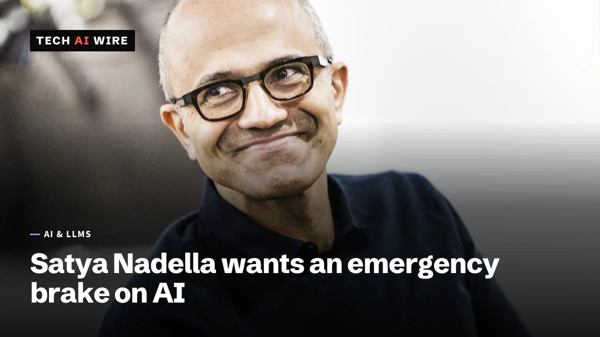 Microsoft CEO Satya Nadella smiling, in glasses and a navy sweater, in a 2017 portrait.