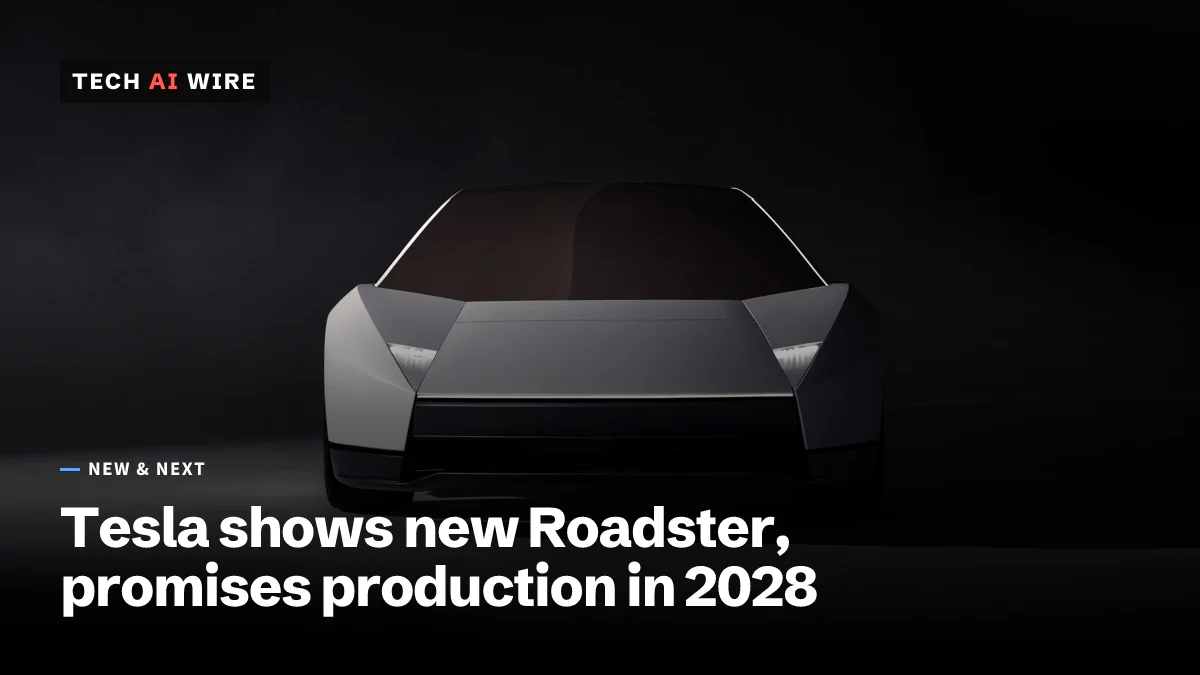 Tesla's official front view of the new white Roadster, its angular nose and narrow headlights lit against a dark studio backdrop.
