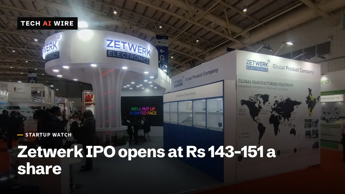 A Zetwerk Electronics booth at an electronics trade show in Bangalore, with a lit Zetwerk sign and a wall map of its global manufacturing footprint.